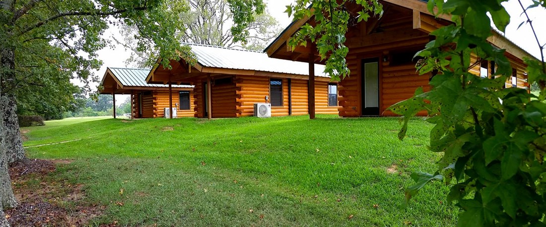 Our 1-bedroom log cabins offer both front and rear porches for relaxing.