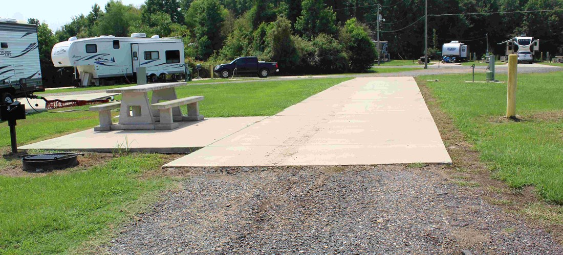 Even our pull-thru basic sites offer long concrete pads, a grill, fire ring, and a picnic table.  Our sites are easy to access for even the longest of motorhomes and RV's.