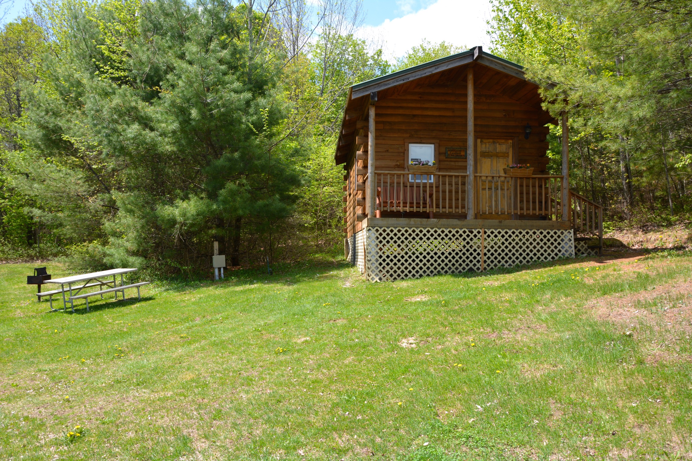 Deluxe Cabin (Full Bath with Tub & Shower), KOA Patio ® Pictures