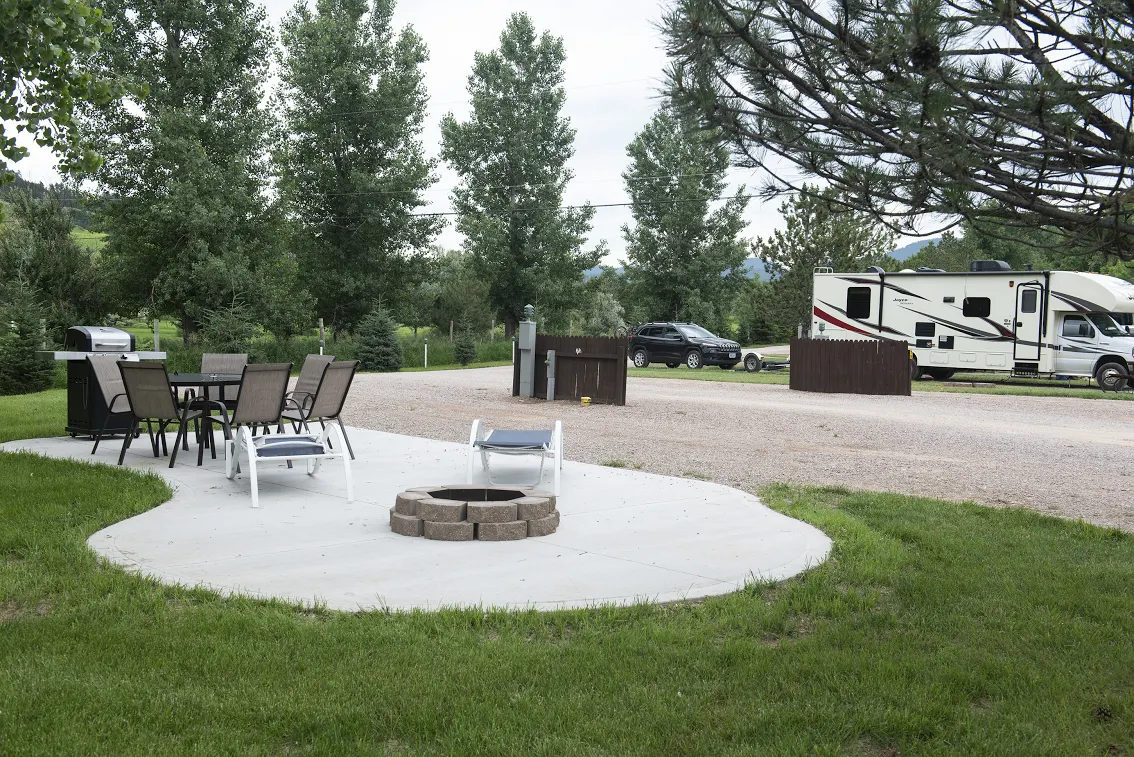 KOA Patio Site.  New spacious patio site.  Grills are now charcoal, new pictures coming!