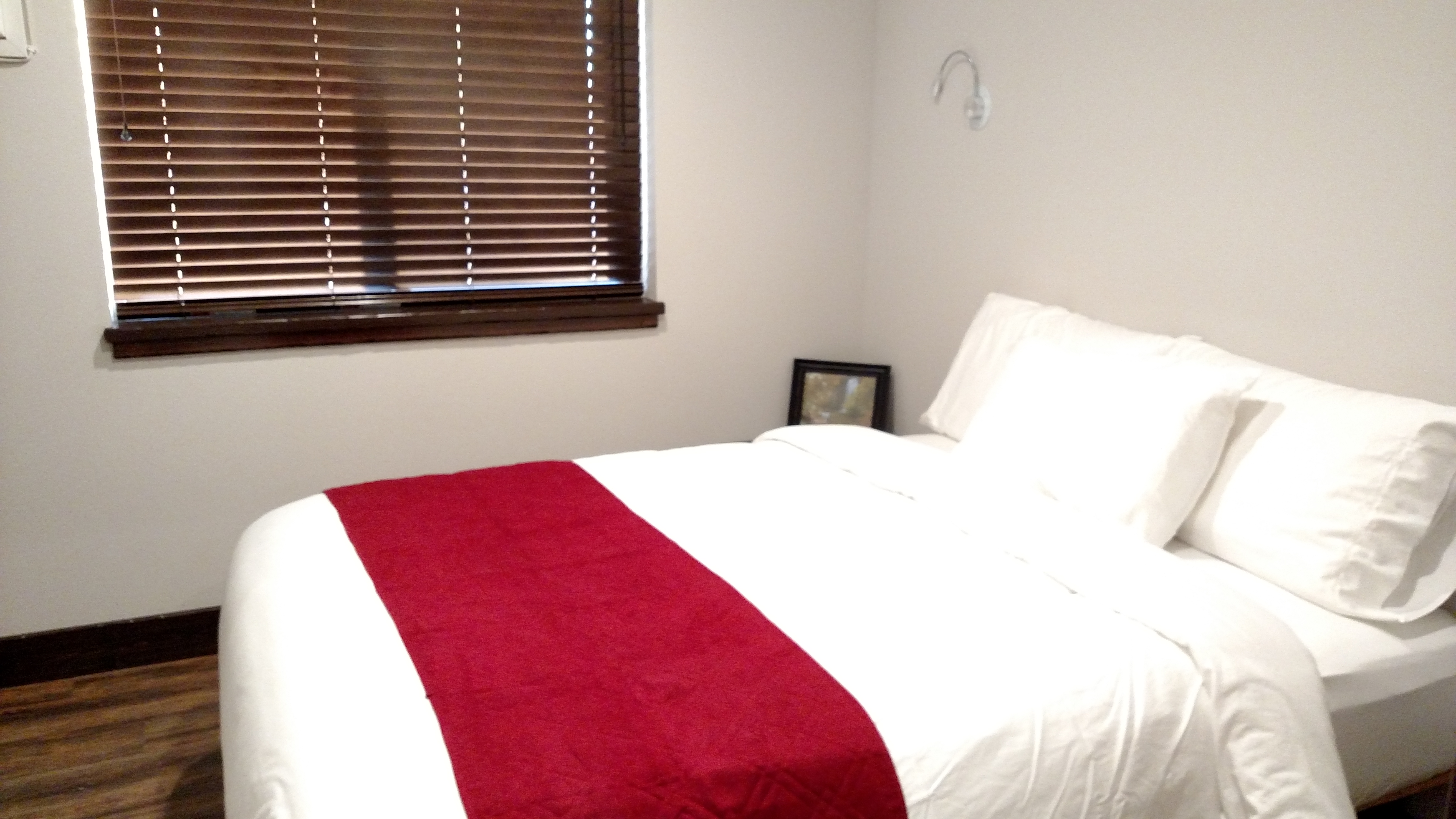 A comfortable queen sized bed.