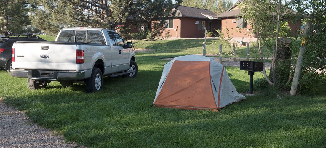 Keep your vehicle close with parking at your site.  Basic tent site.