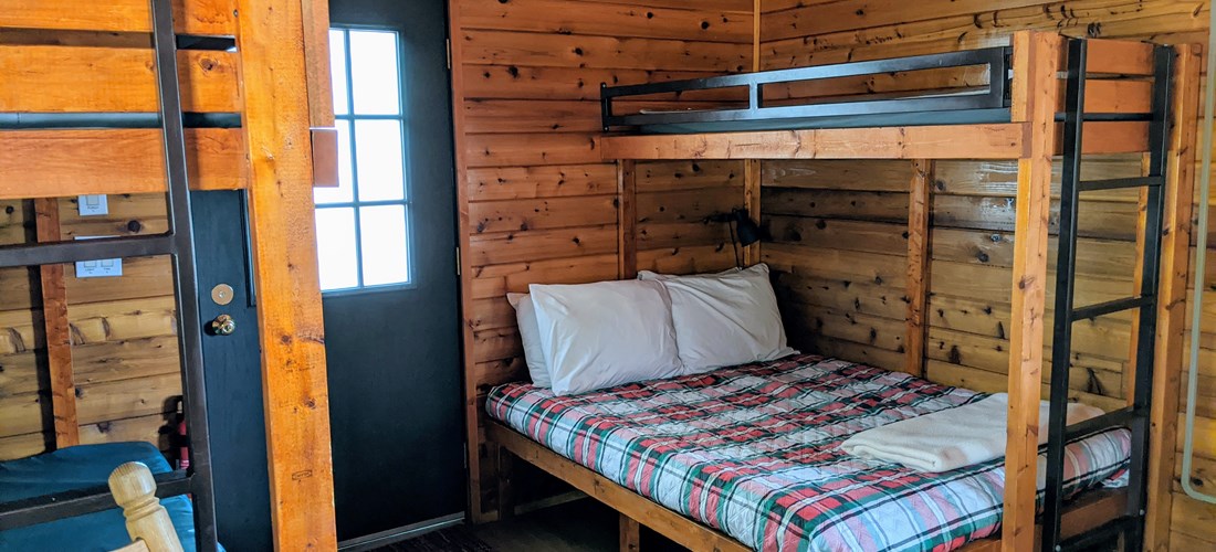 Queen bed and three bunks