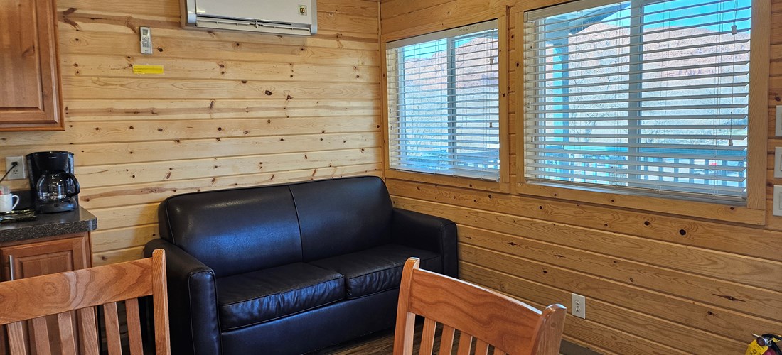 Deluxe Family Lodge Living/Dining Room with views of the Red Cliffs Recreation Area