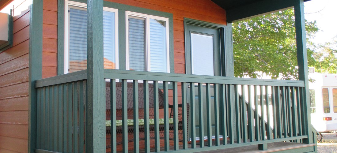 Deluxe Studio Cabin Front Porch with Red Cliffs Views