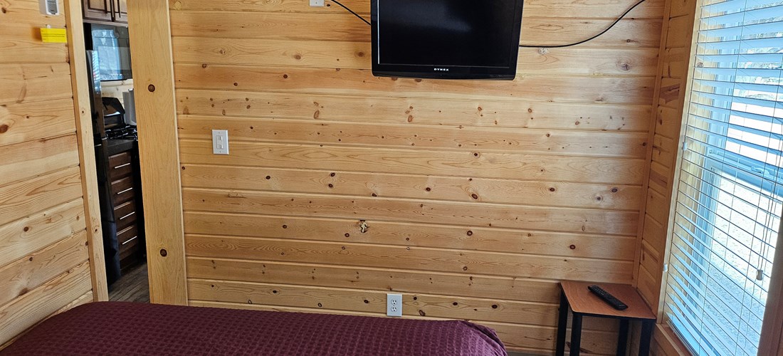 Each bedroom in the Deluxe Family Lodge has a TV