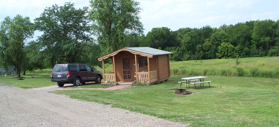 Standard Cabin with Porch Swing, Picnic Table, and Fire Ring
