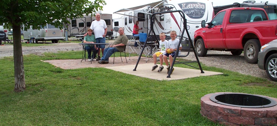 Deluxe Patio Site.  Enjoy one of our most popular  & spacious sites.  Brick Patio, Fire Ring, Patio Swing, and Furniture.