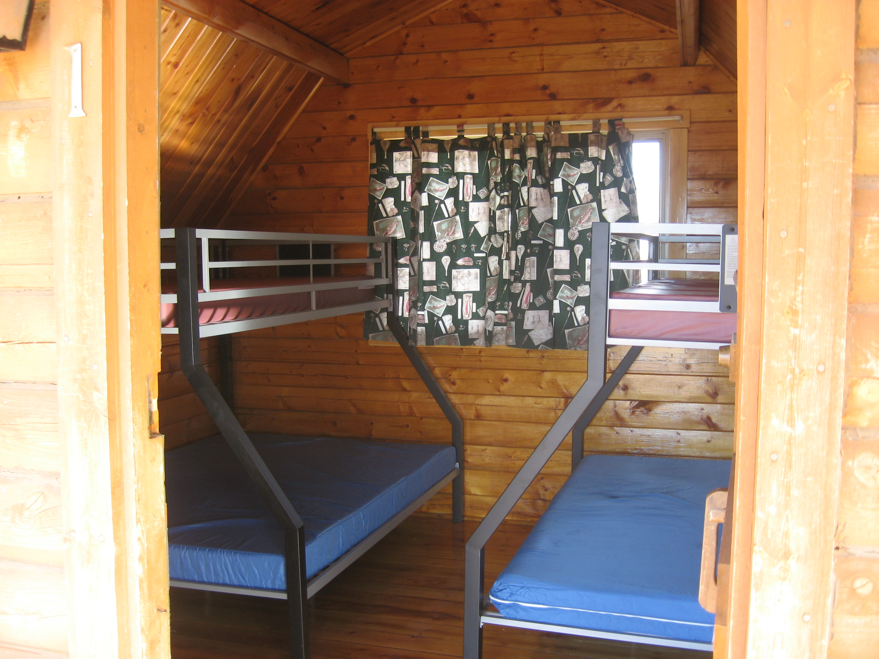 K1 has unique sleeping, 2 double beds, with twin bunks over each, great for family's with 4 kids , will not accommodate more than 4 adults