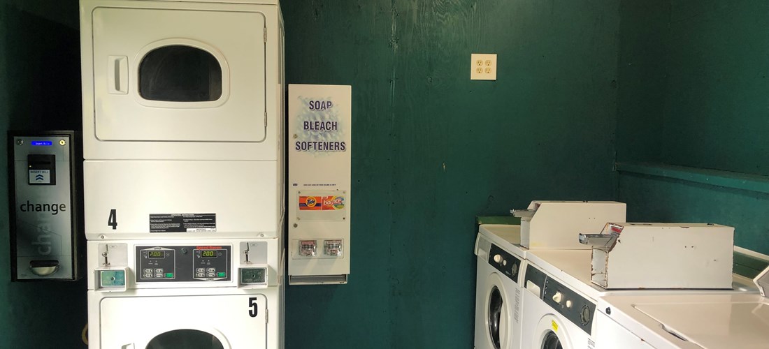 Laundry has change machines and detergent/dryer sheets vending
