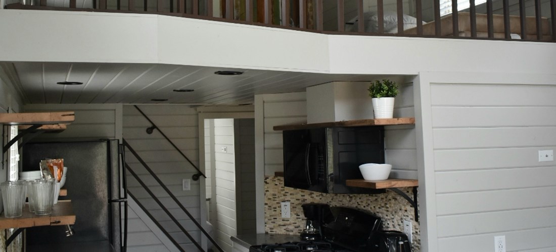 Kitchen and loft in a 1 bedroom cabin