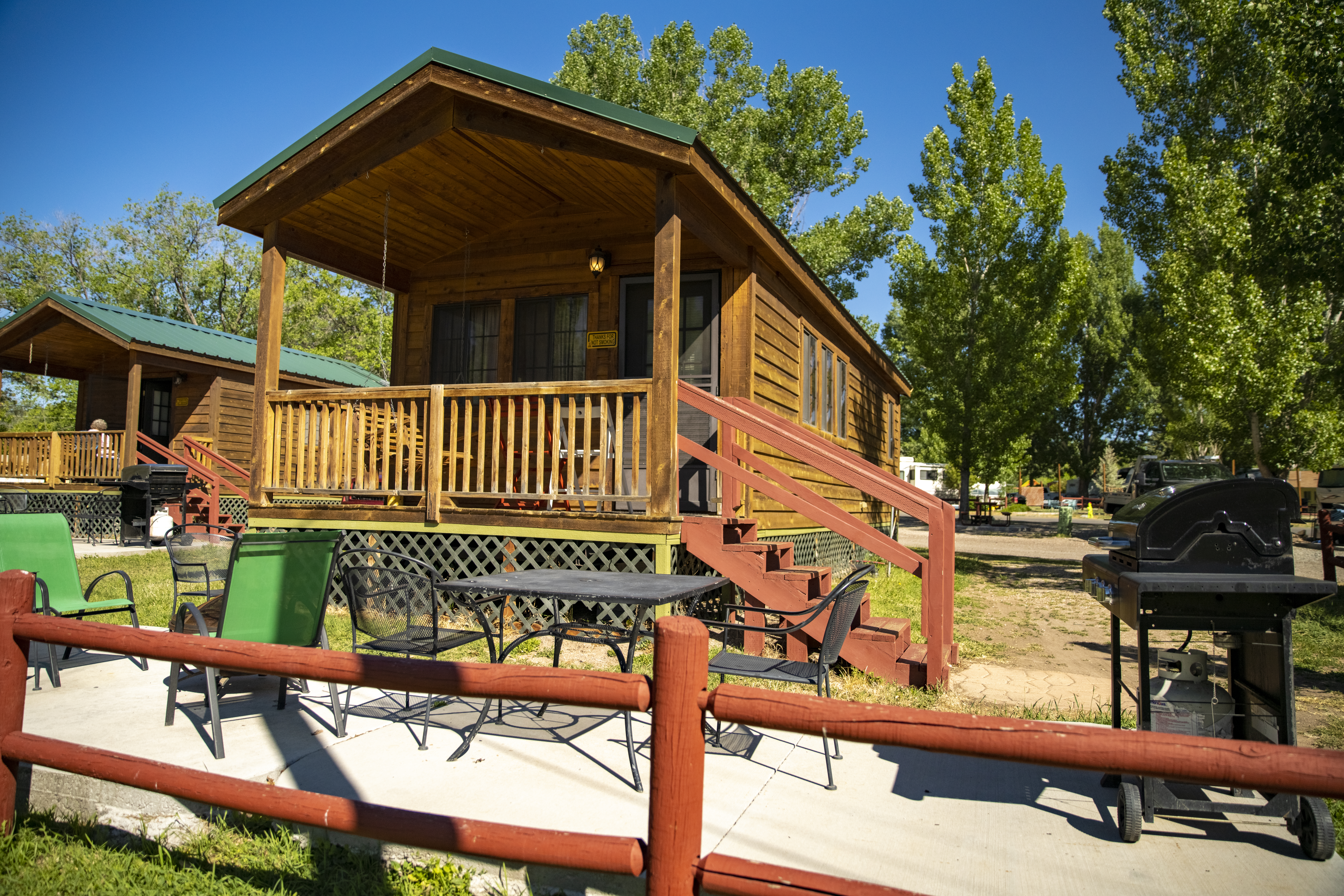 Deluxe Cabin (Full Bath with Tub & Shower), KOA Patio ® / "Butch