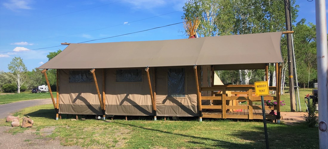 Side view of Woody Tent with parking area.