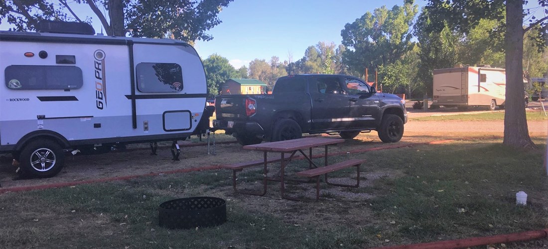 If your combined length is over 45 ft, you will need to disconnect and park to the side of the RV.