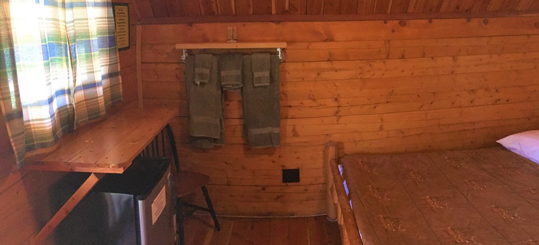 Mini-fridge, fan, space heater and linen provided in these cabins.