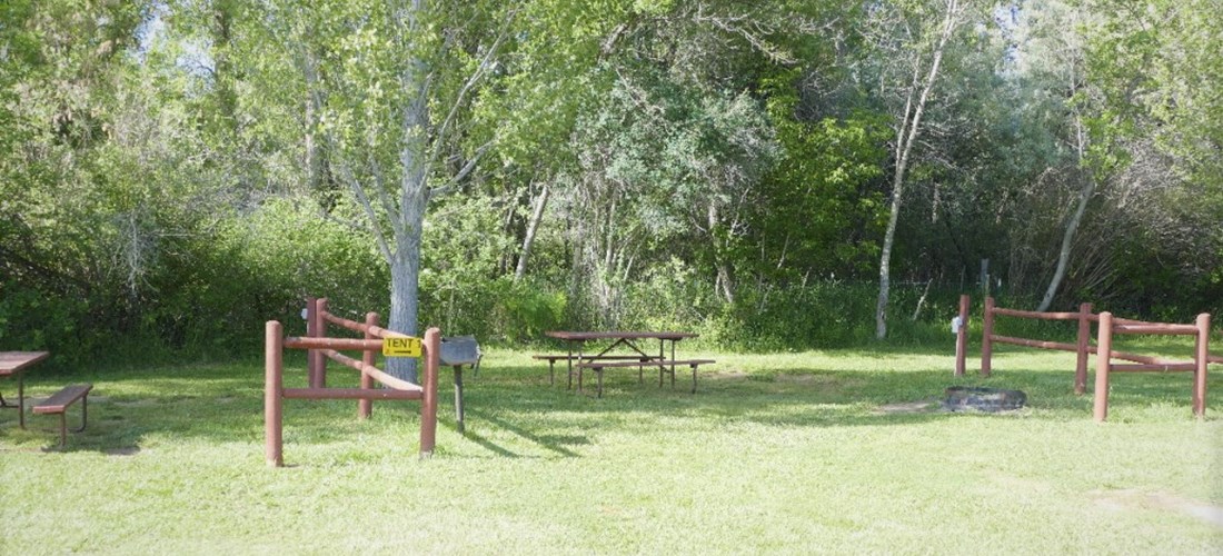 Park right along the fence, in front of your tent site for easy unloading of your camping gear.