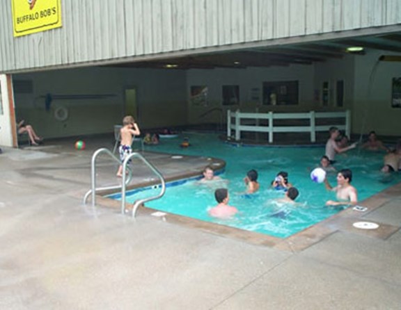 Our pool is partially indoors and also outdoors.  There is a large patio area so you can either soak up the sun or sit in the shade.  The kids can swim without worrying about sun burn, or rain storms.  There is also an adult only Hot Tub.