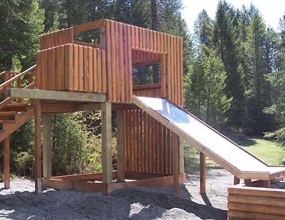 There is a large playground in the middle of our park where kids of all ages will find something to do.  They can climb in the fort, slide down the slide, climb the cargo net, play catch or volleyball.