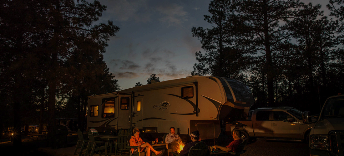 Deluxe Patio RV Site - Small at Night with Campfire