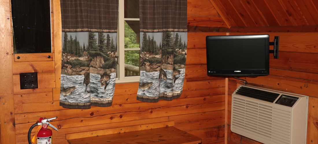 Enjoy A/C, Heat, and Cable TV in all Camping Cabins