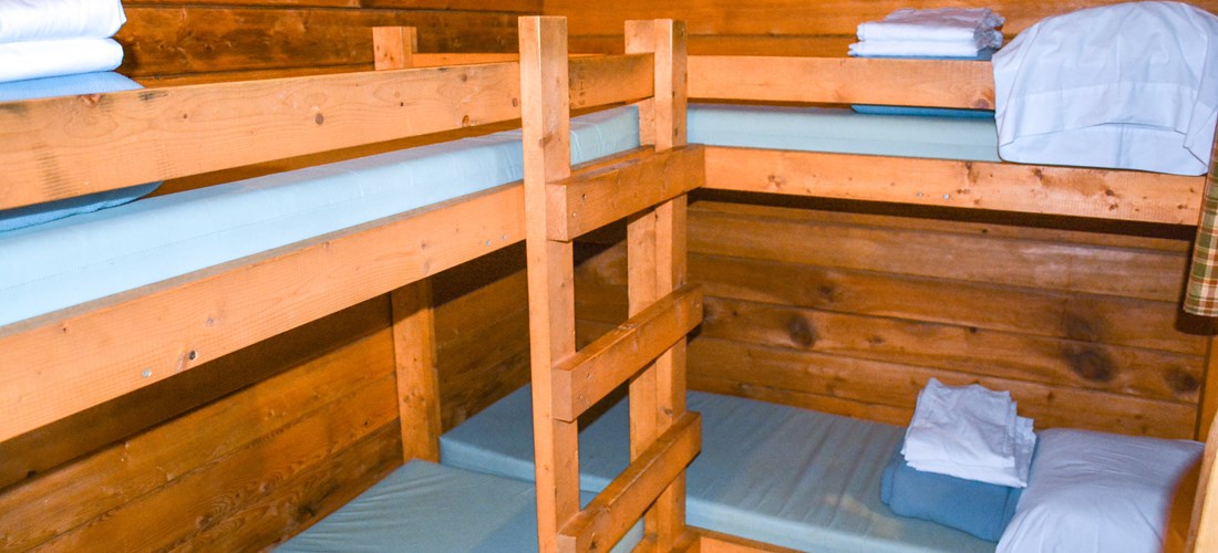 The bedroom comes with 2 single bunks and linens are included.