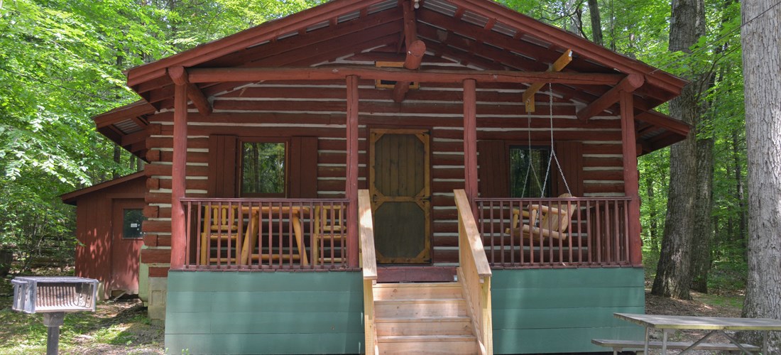 The Large Log Cabin Home is in a secluded wooded area for you and your family to enjoy.