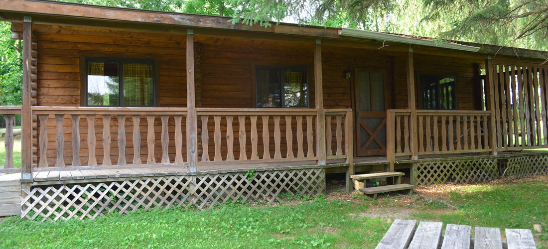 The Country Cottage is great for larger families. It is located in a more secluded setting and comes with a full kitchen, living area, and bathroom.