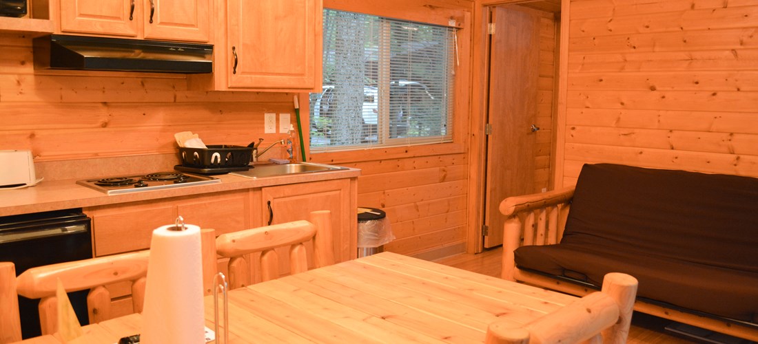 The Deluxe Cabin sleeps up to 6 people with the use of the futon.