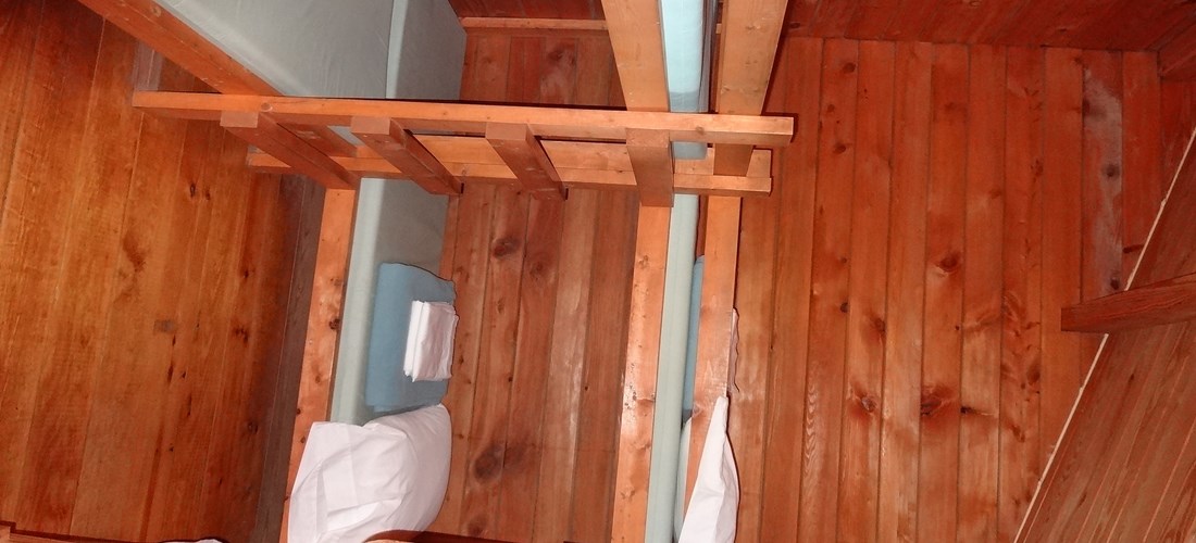 The bedroom comes with 2 single bunks and linens are included.