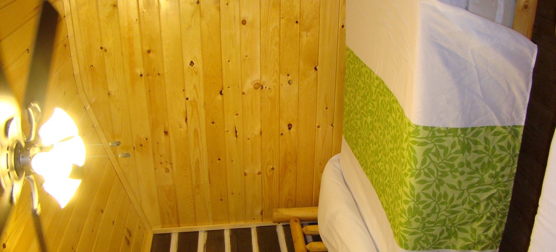 The bedrooms include 2 double beds and linens are provided.