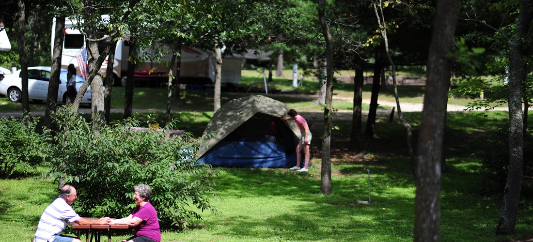 Wisconsin Dells KOA Individual Tent Site with Grass Tent Pad
